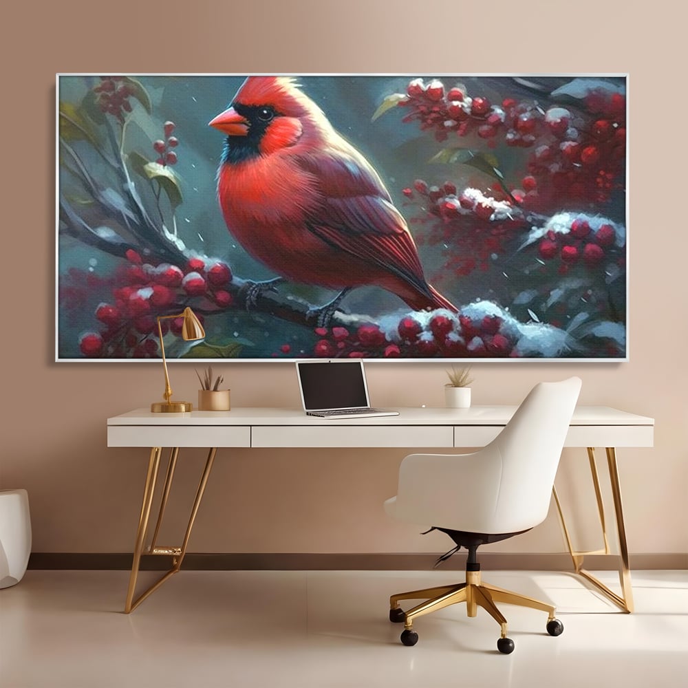 Tablou canvas cu tablou canvas cu pasare cardinal pe ramura inzapezita, in rama de aluminiu argintiu, pe perete intr-un birou